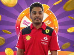 Laurence Escalante Ferrari F1 asussa Chumba Casino taustan edessä.