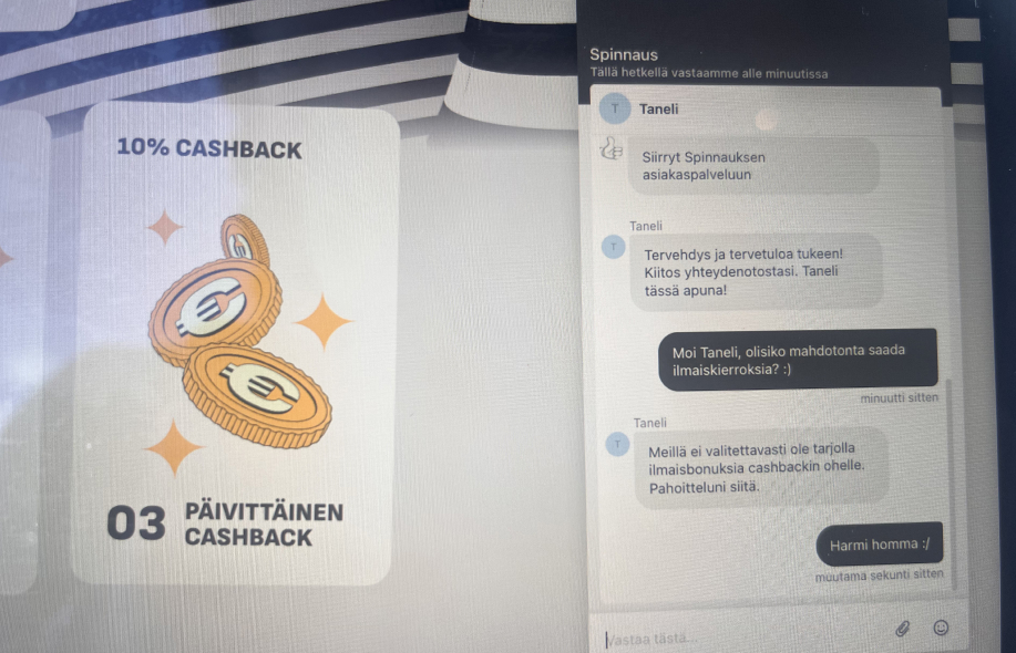 Spinnaus-kasinon asiakaspalveluchat-ikkuna, jossa asiakastuki nimeltä Taneli kertoo, ettei ilmaiskierroksia ole tarjolla. Ylhäällä lukee myös "10% cashback" ja "Päivittäinen cashback".

