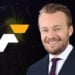 Fennica Gaming logo ja Erik Nyman. Taustalla Suomi ja sen "viennit" korostettuna kartassa.